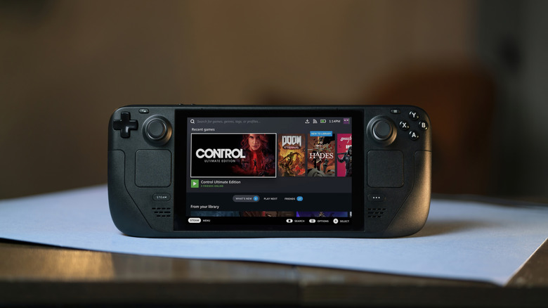 Steam Deck with multiple games on its home screen
