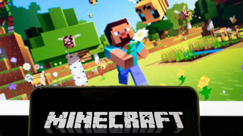 Minecraft logo in the foreground with blurry screenshot in the background
