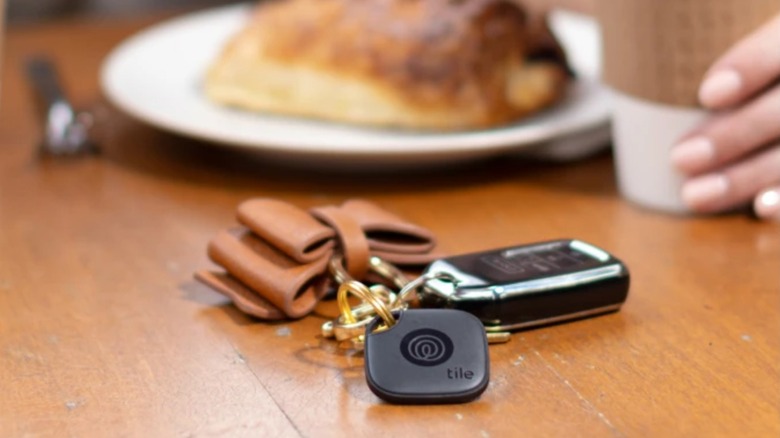 Time Mate clipped on to car fob on table