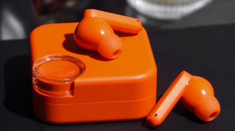 The CMF By Nothing Buds 2 wireless earbuds and their charging case.
