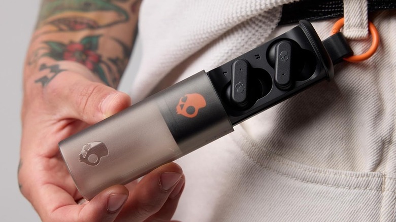 The Skullcandy Dime Evo wireless earbuds and their charging case.
