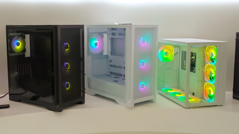 Multiple PC cases with RGB lighting side by side