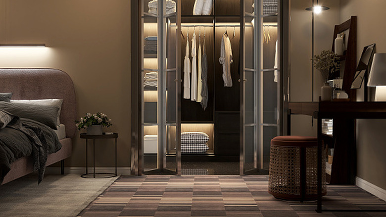 An illuminated walk-in closet