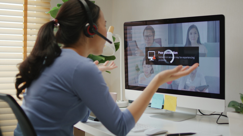 A woman disconnected from an online meeting due to a poor internet connection.