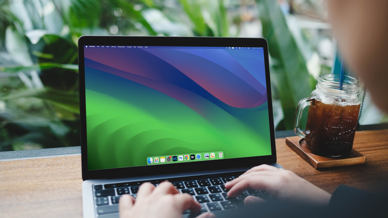 Closeup of MacBook Pro laptop computer running on macOS Sonoma.