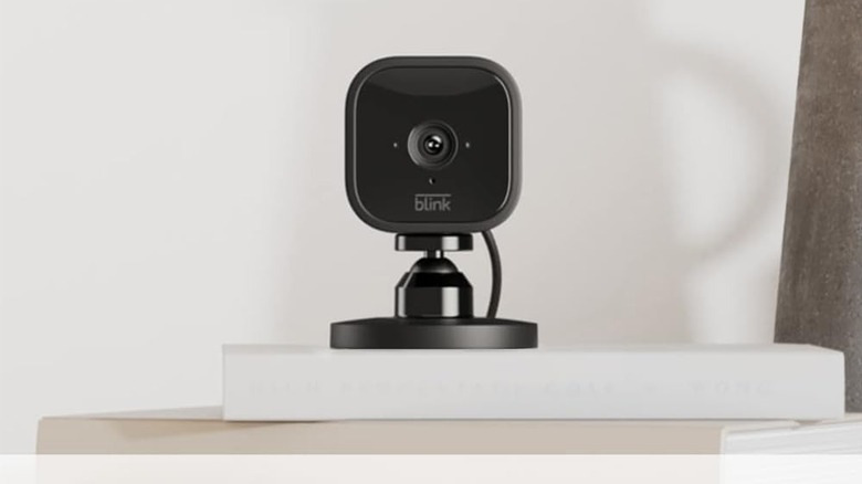 Blink Camera on a shelf watching a living room