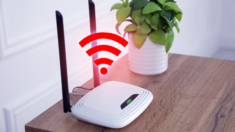 Wi-Fi router with a red Wi-Fi signal hanging above it