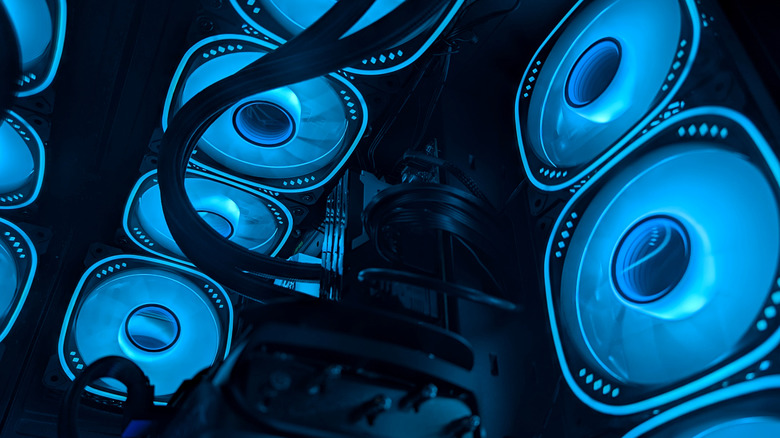 An array of RGB lit cooling fans facing different directions