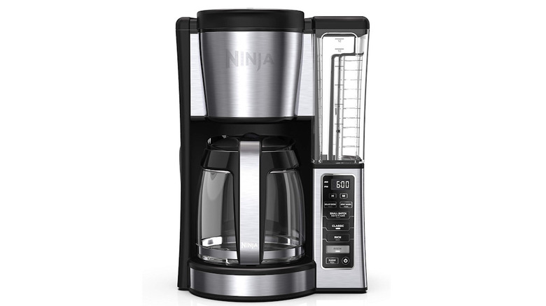 Ninja 12-Cup Programmable Coffee Brewer facing forward with a full water reservoir and empty pot