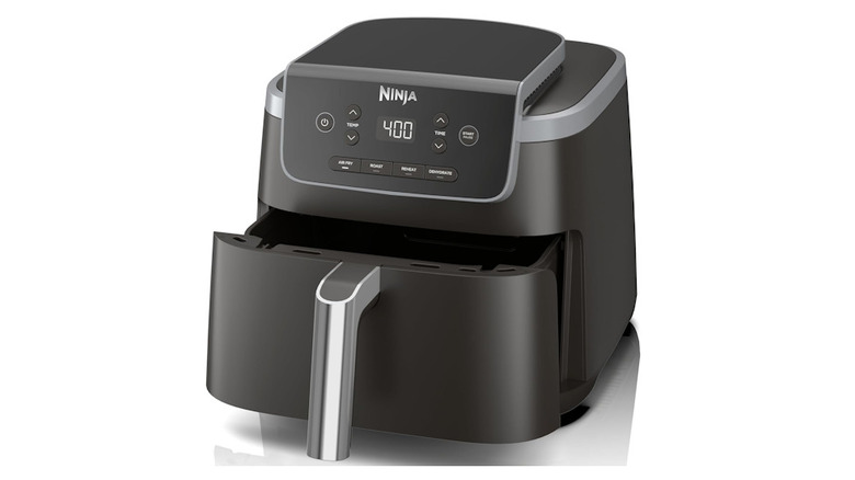 Ninja 4-in-1 Air Fryer with tray partially open showing temperature inside device on display