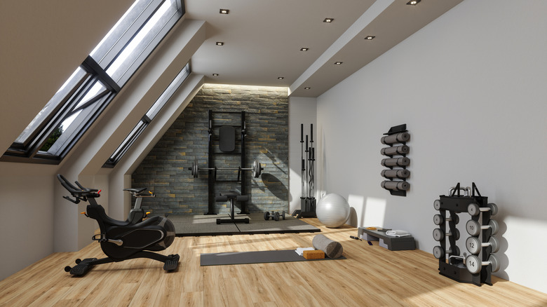 A home gym with different kinds of equipment.