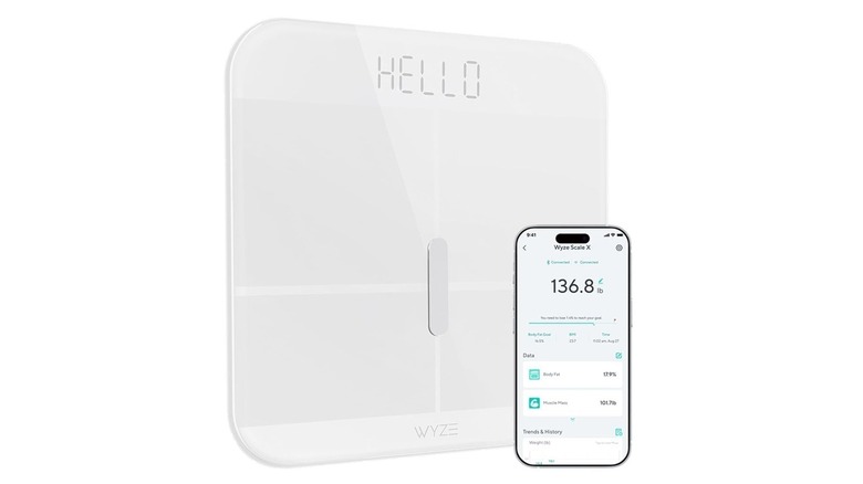 The Wyze Scale X and its companion app on a smartphone, on a white background.