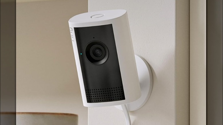 The Ring Indoor Cam Plus security camera placed on a table.