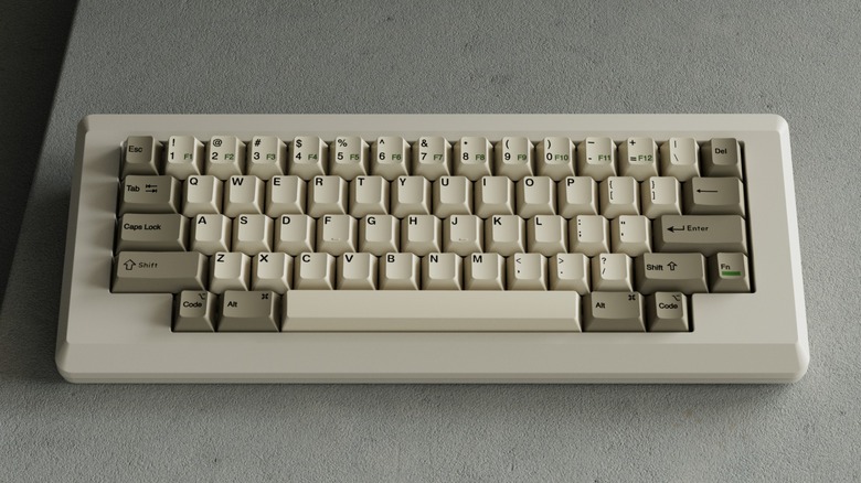 The Vortex Keyboard M0110 on a white or gray surface