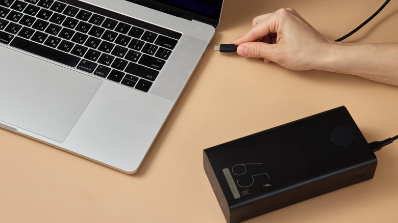 Accessory plugging into a laptop port