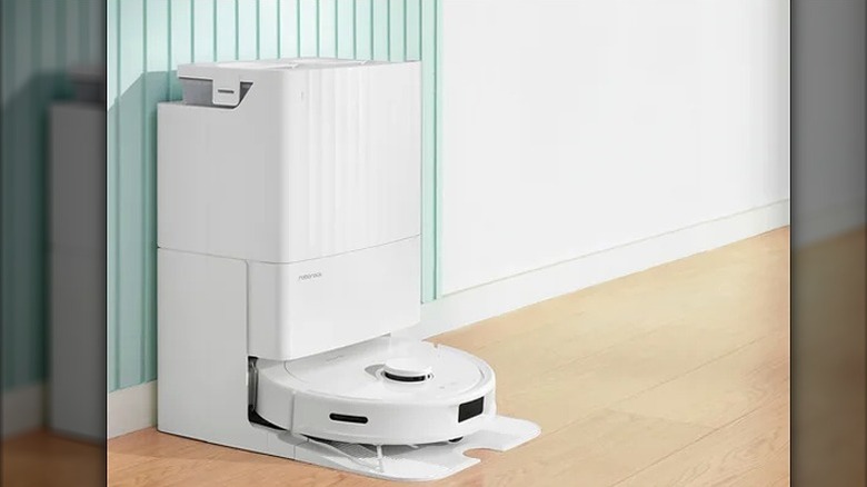 Robot vacuum docked in base