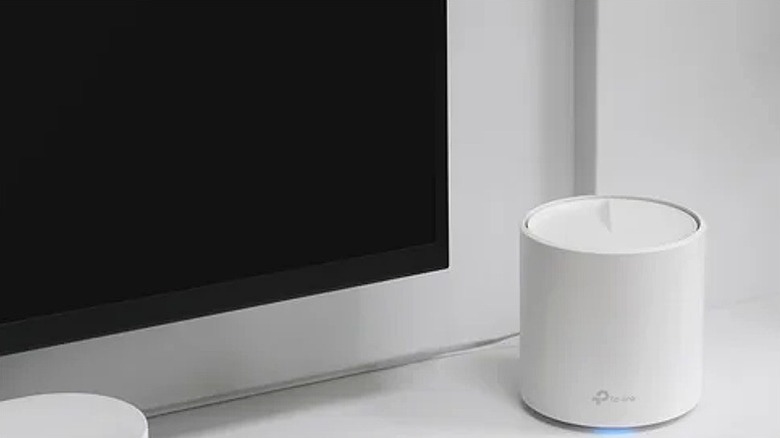 Three TP-Link mesh routers