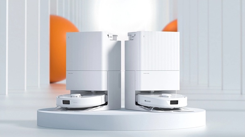 Two robot vacuum devices docked