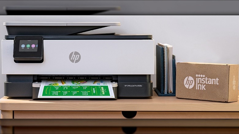 HP grey and black printer and ink box