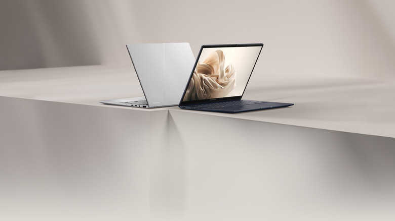Two ASUS Zenbook 14 laptops displayed