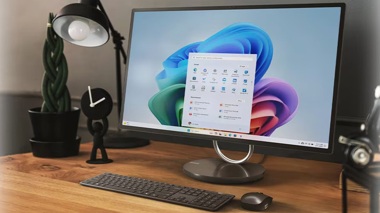 Lenovo desktop computer on top of a neat wooden desk