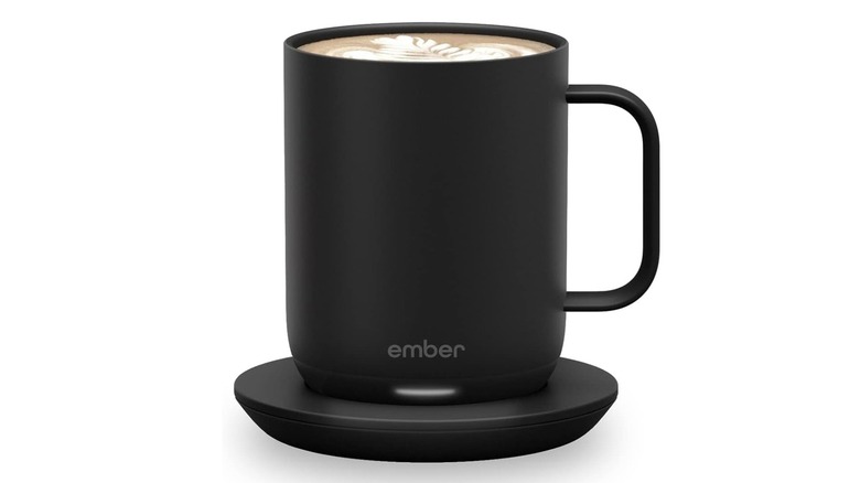 The Ember Mug 2 smart mug on its charging coaster, on a white background.
