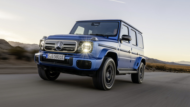 The Mercedes-Benz G-Class EV zooming down a road