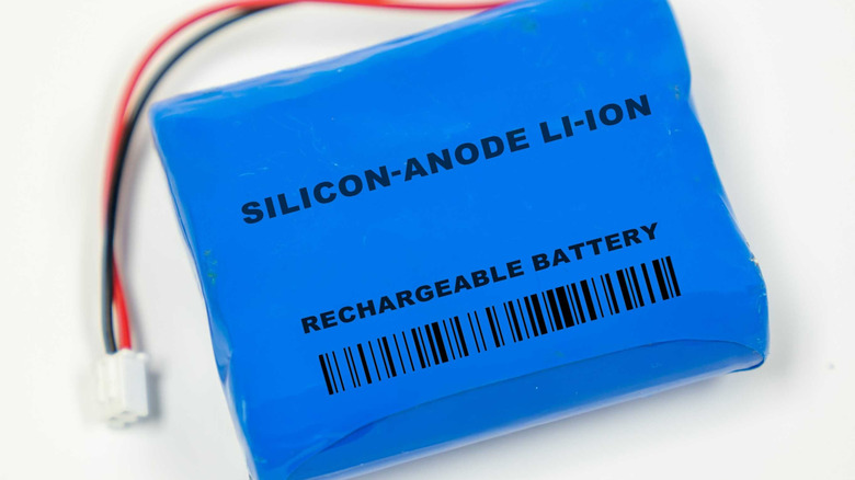 A close-up of a rechargeable battery pack labeled "Silicon-Anode Li-Ion."