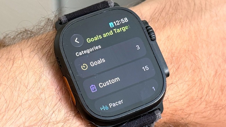 Close-up shot of an Apple Watch Ultra displaying the Workouts app