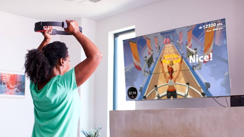 Person playing "Ring Fit Adventure" game