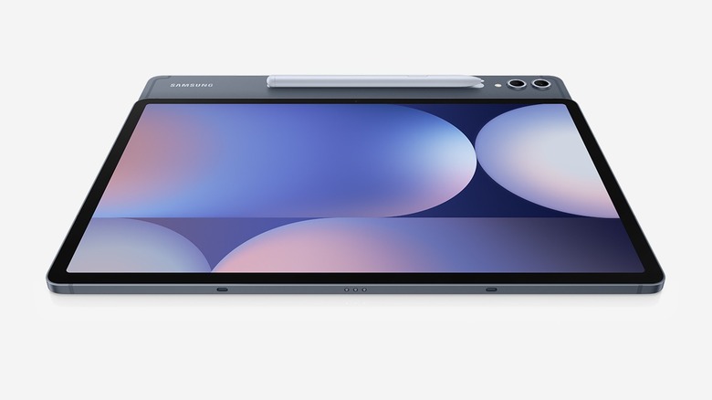 The Samsung Galaxy Tab S10 Plus with its stylus on a gray background.