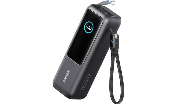The Anker Power Bank with USB cables pointing out and highlighted display showing power capacity