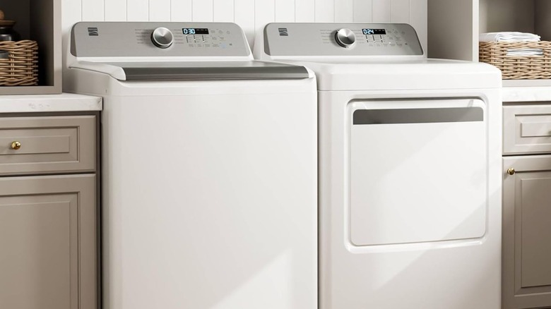 Kenmore washing machine and dryer in laundry room