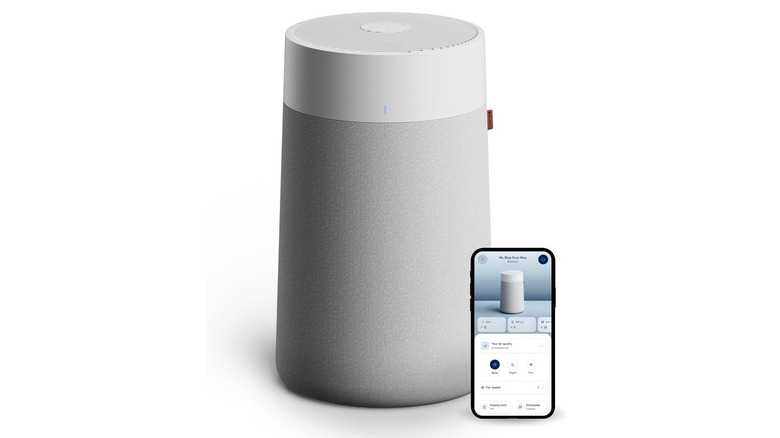The Blueair Blue Pure 311i Max Air Purifier and its companion app on a white background.