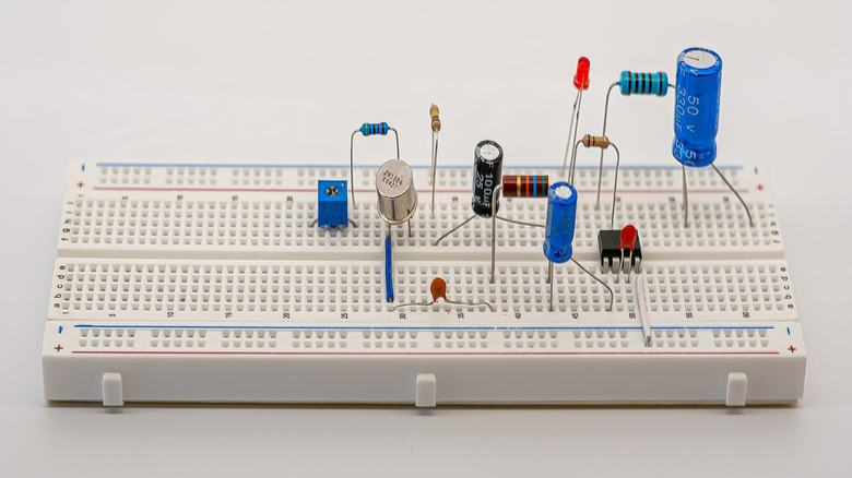 A breadboard with multiple electronic components mounted on it