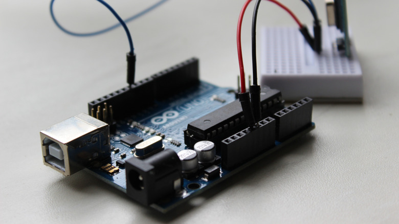 An Arduino connected with a breadboard and other components
