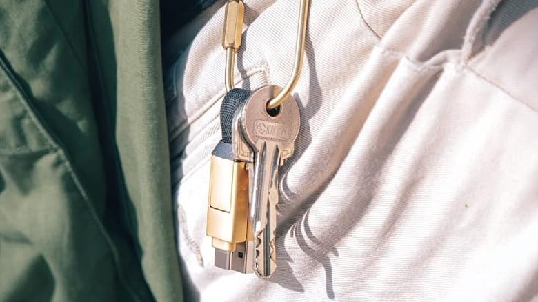 The Rolling Square inCharge 6 charger cable attached to a keychain.