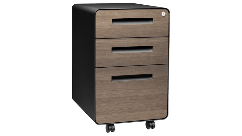 A Laura Davidson Stockpile curved metal filing cabinet against a white background.
