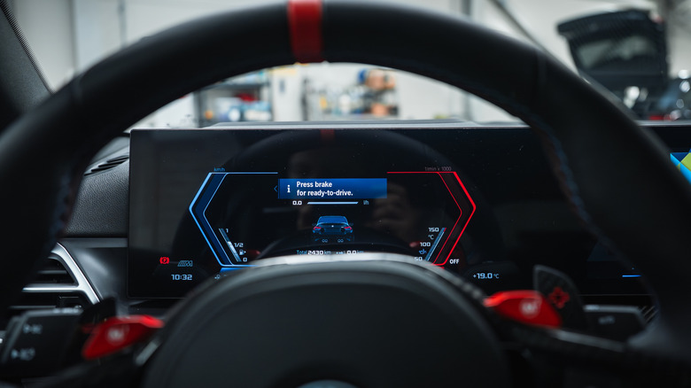 Close up of a steering wheel and dahsboard in an electric vehicle