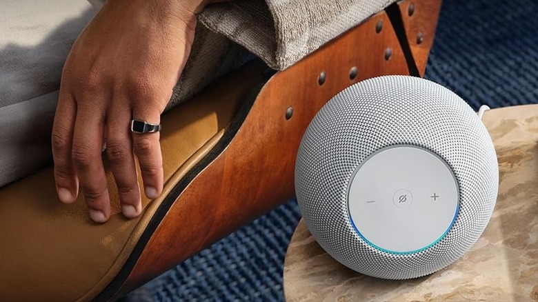 Alexa Studio speaker next to a person
