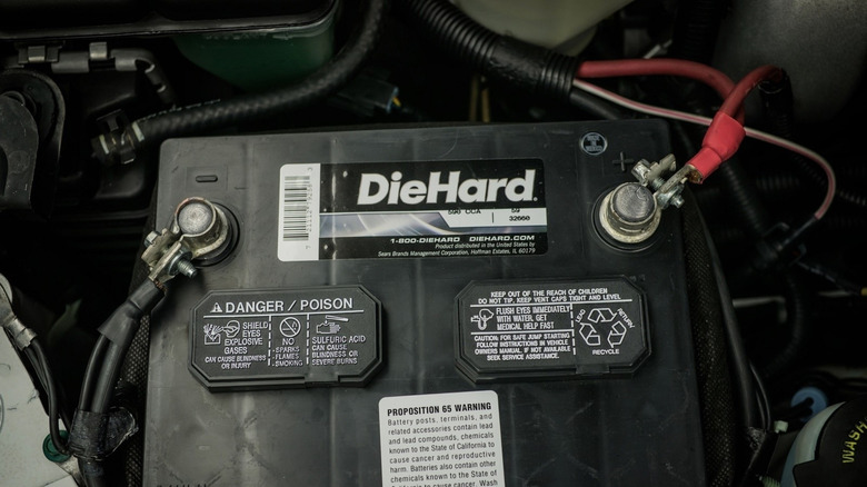 A DieHard car battery in a vehicle.