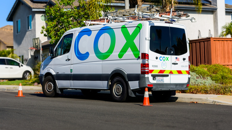 Cox communications service van parked in residential street