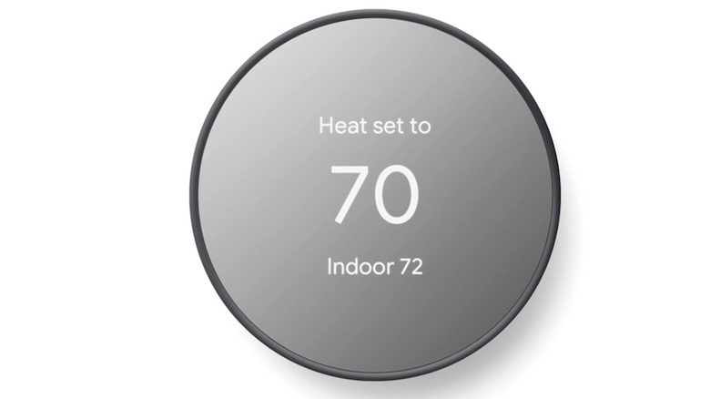 Google Nest Thermostat with a fully lit display