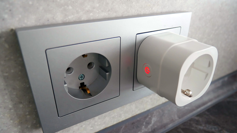 a smart plug in a power outlet