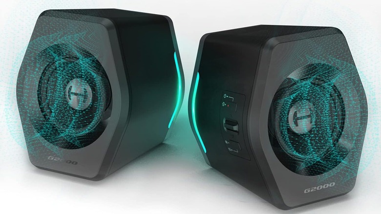 The Edifier G2000 speakers with their lights on, on a white background.