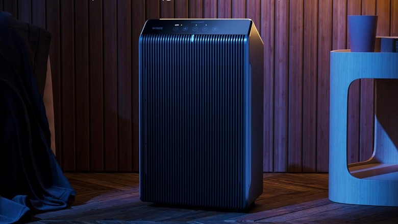 The Winix 5510 air purifier in a dark room.