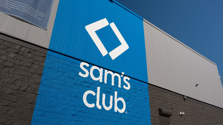 The logo of Sam's Club on the side of a building.