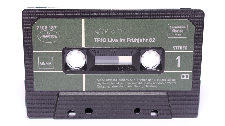 A black and green West German cassette tape titled "TRIO live im Frühjahr 82."