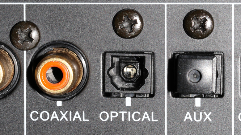 A TOSLINK optical port on the back of an AV device.