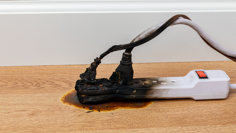 a close up of a burnt out power socket